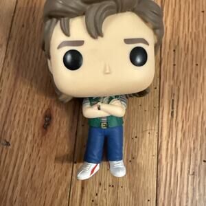 Funko Pop! Figure with Brown Hair, Cream Face, Green Vest, Blue Pants